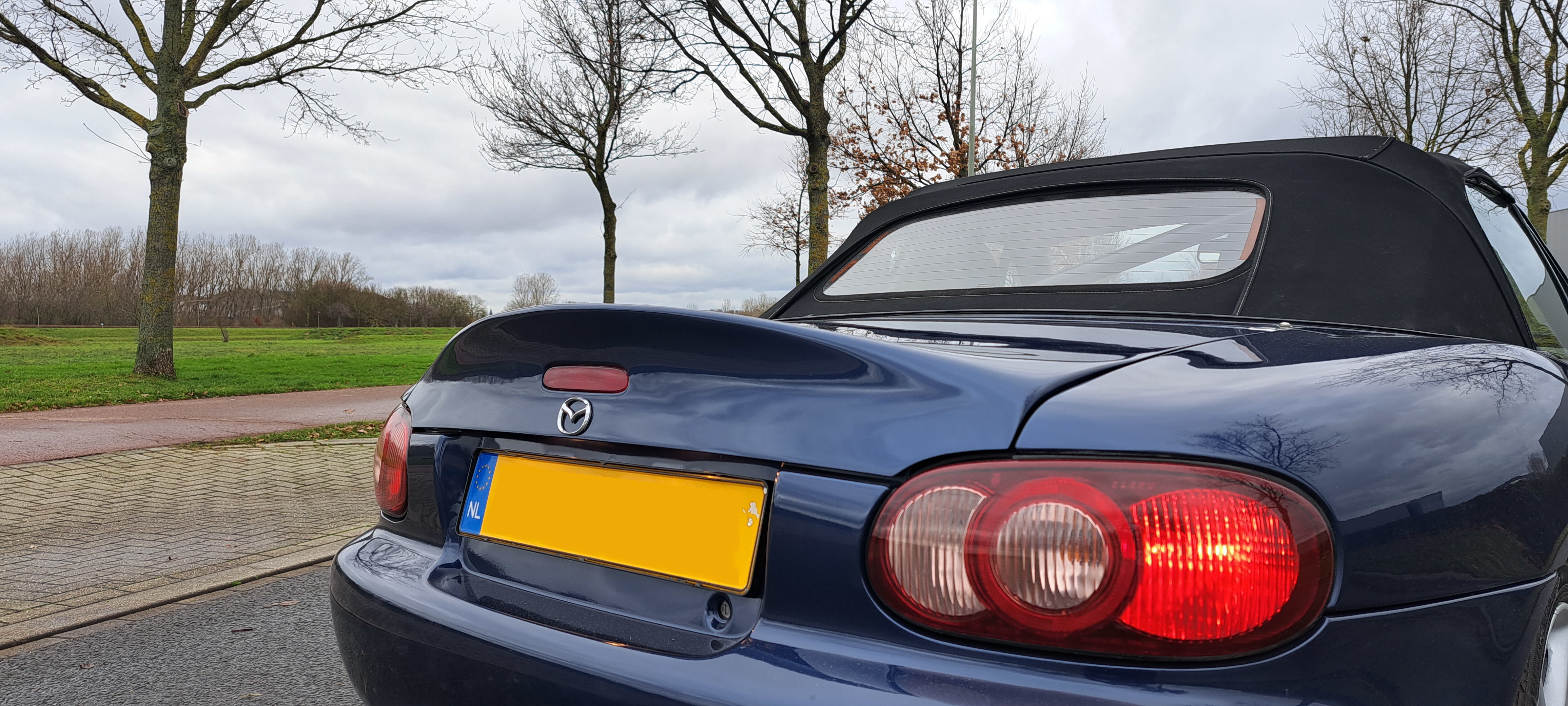 Ducktail spoiler mx5 discount